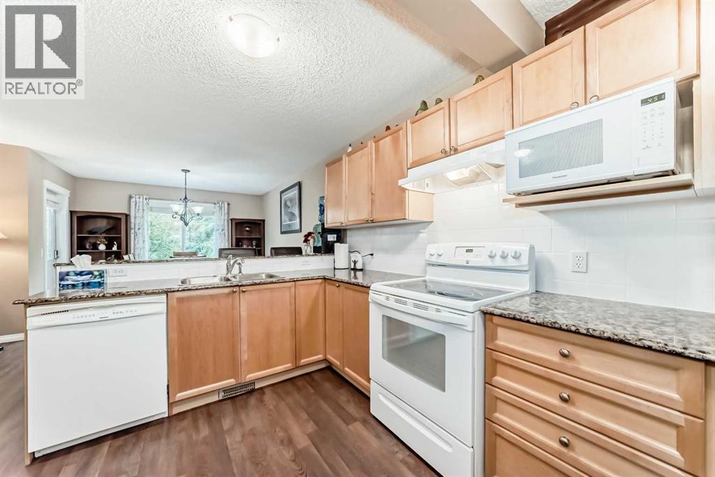 66 Cougar Ridge Circle Sw, Calgary, Alberta  T3H 5C8 - Photo 6 - A2259579