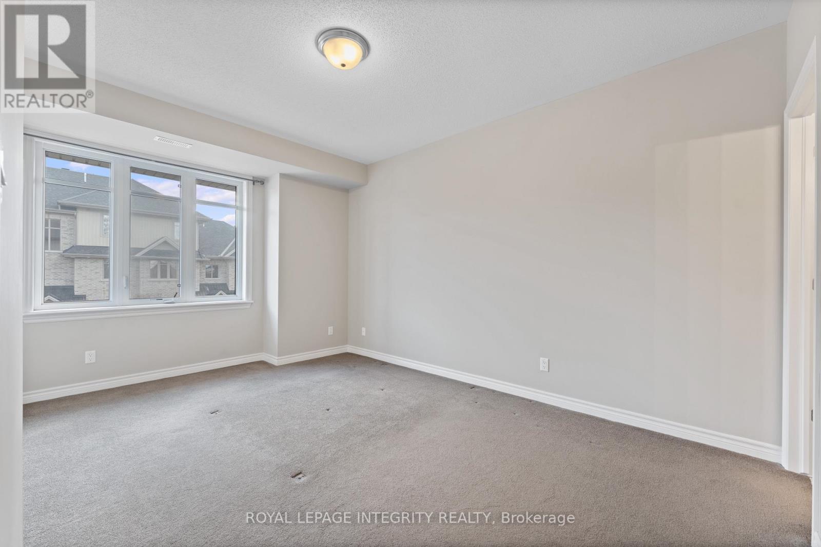 F - 21 Tadley Private, Ottawa, Ontario  K2J 2T3 - Photo 16 - X12520054