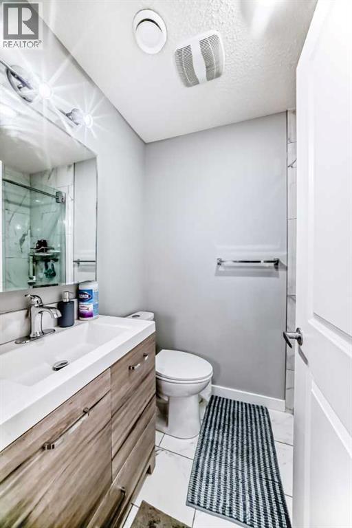 411 Sage Hill Grove Nw, Calgary, Alberta  T3R 0Z8 - Photo 11 - A2263055