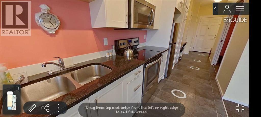 Property at 2305, 215 Legacy Boulevard SE image 2