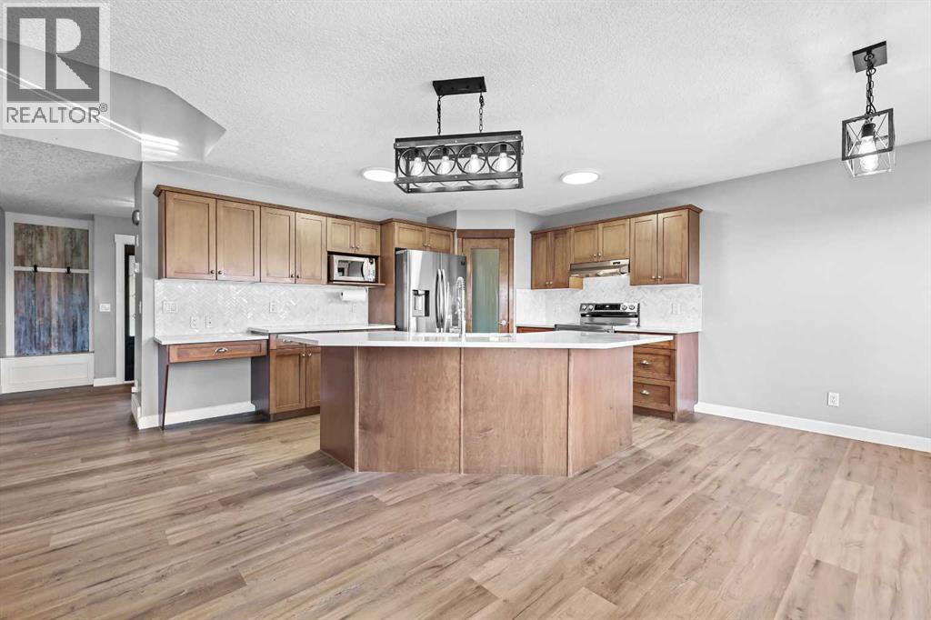 276 Oakmere Close, Chestermere, Alberta  T1X 1L2 - Photo 4 - A2266971