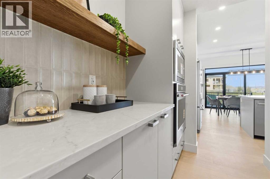 11 Rowmont Gardens Nw, Calgary, Alberta  T3L 0M1 - Photo 12 - A2268052