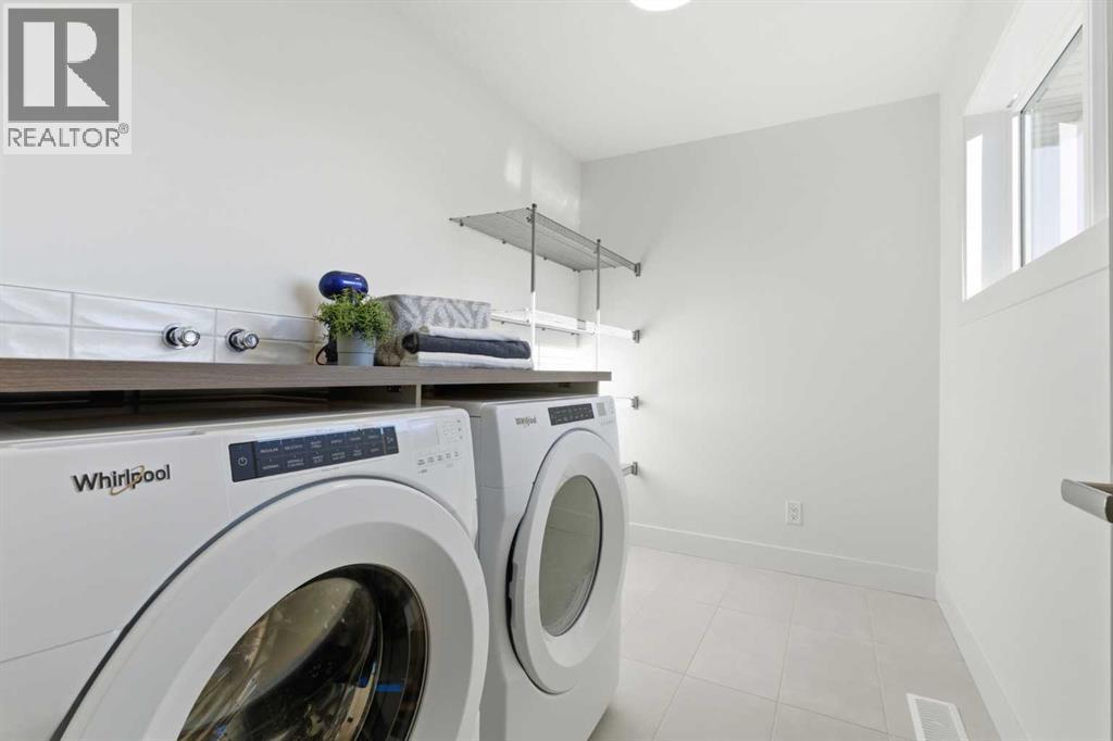 11 Rowmont Gardens Nw, Calgary, Alberta  T3L 0M1 - Photo 38 - A2268052