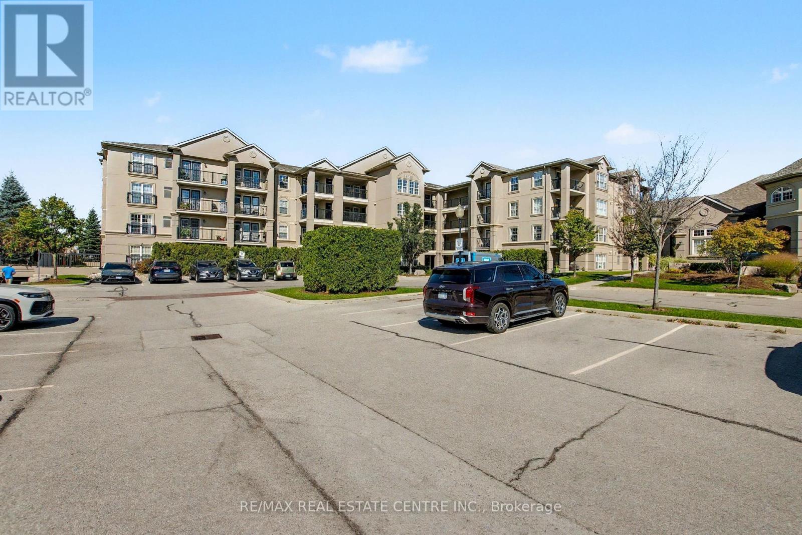 204 - 1380 Main Street E, Milton, Ontario  L9T 7S4 - Photo 4 - W12440503