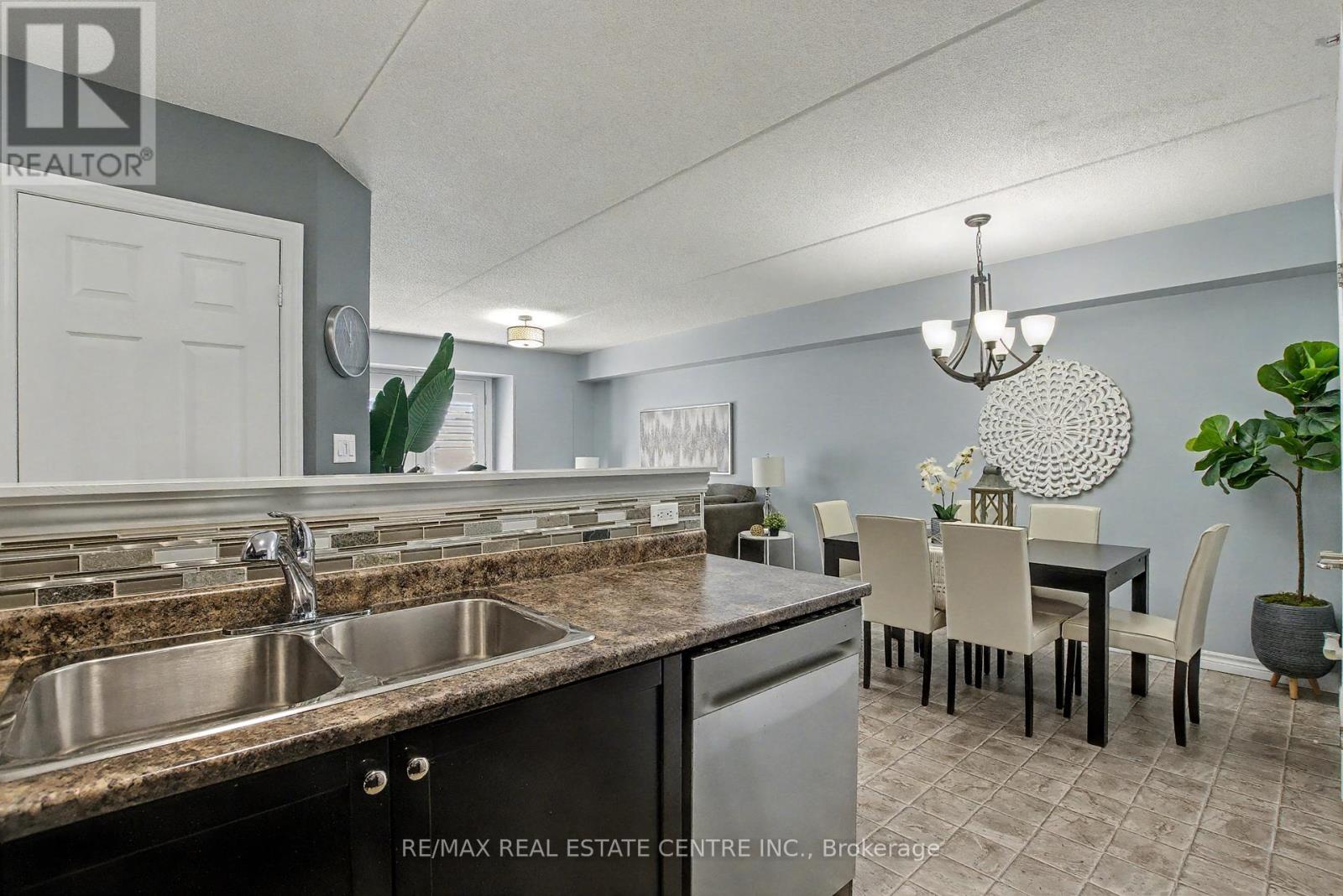 204 - 1380 Main Street E, Milton, Ontario  L9T 7S4 - Photo 3 - W12440503