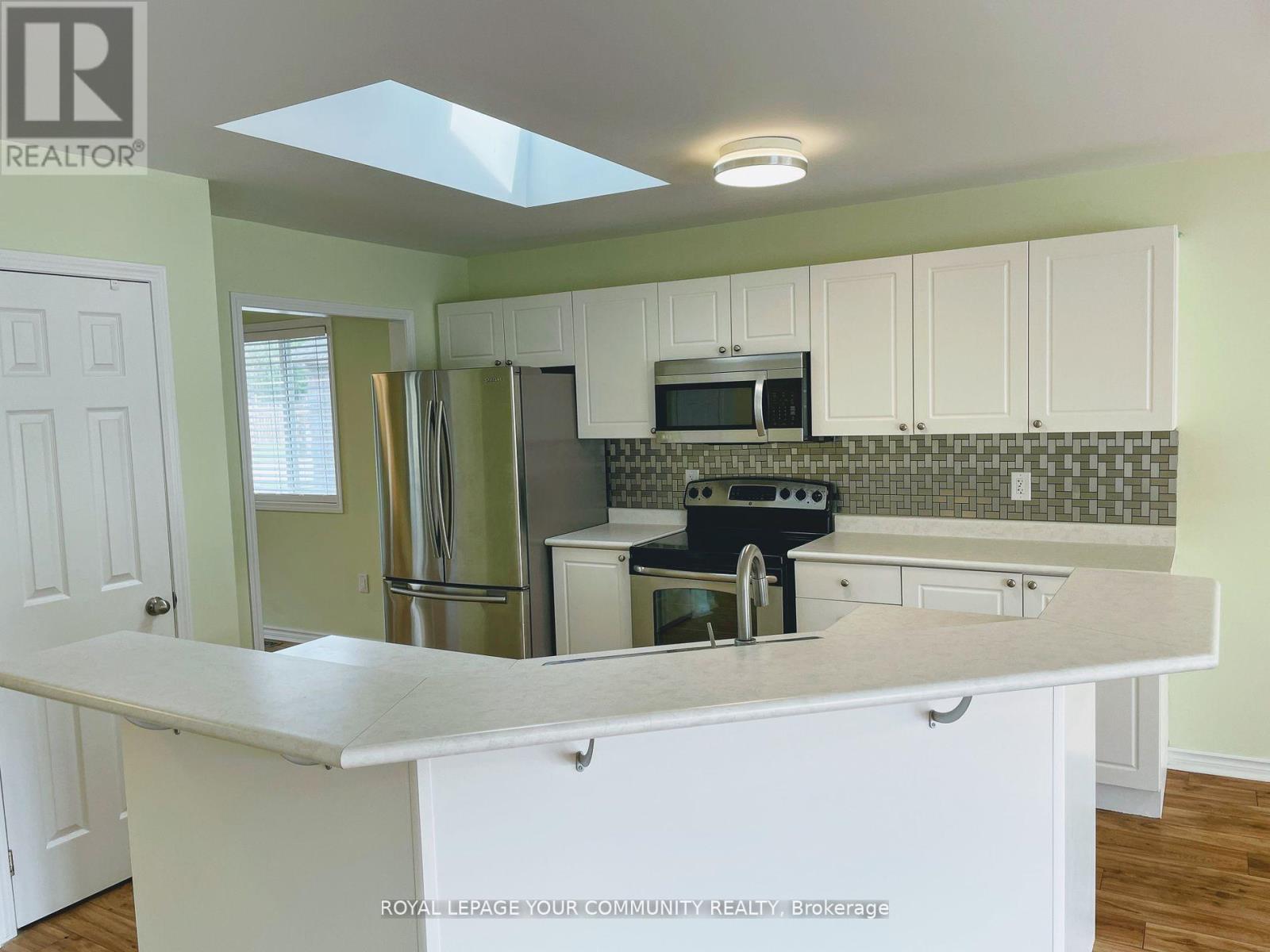 Main Floor - 24 Sun King Crescent, Barrie, Ontario  L4M 7J9 - Photo 11 - S12521094