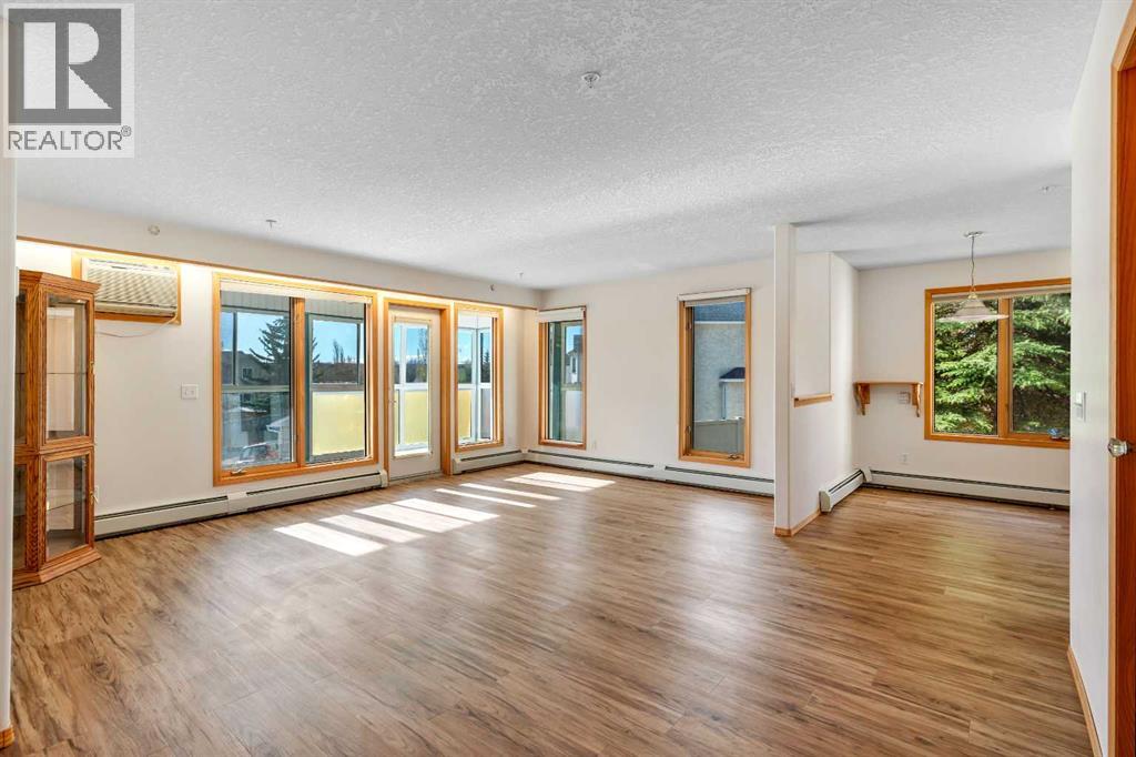 135, 7229 Sierra Morena Boulevard Sw, Calgary, Alberta  T3H 3L8 - Photo 2 - A2261309