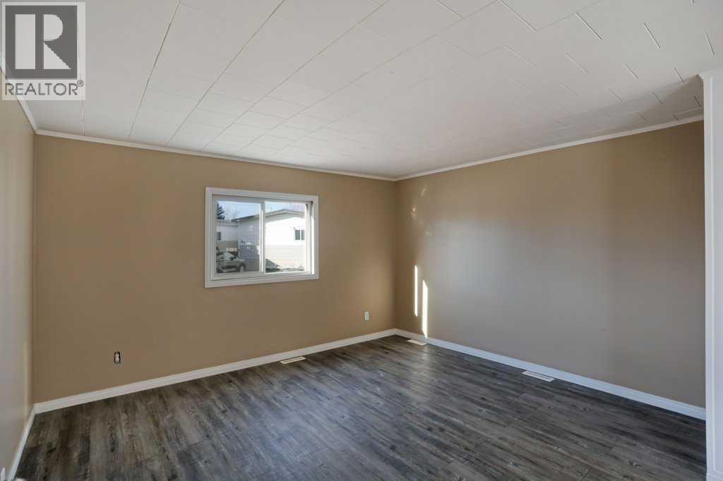 52 Lake Stafford Crescent, Brooks, Alberta  T0J 2A0 - Photo 6 - A2267547