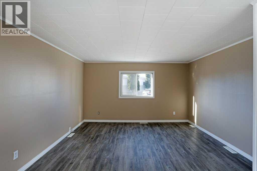 52 Lake Stafford Crescent, Brooks, Alberta  T0J 2A0 - Photo 5 - A2267547