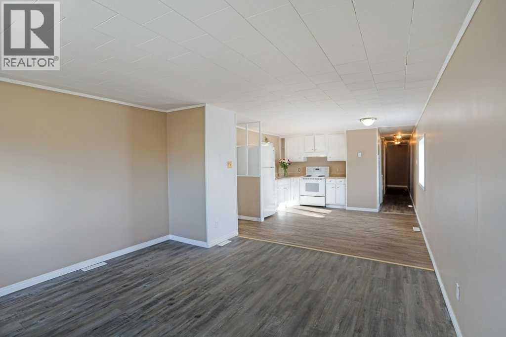 52 Lake Stafford Crescent, Brooks, Alberta  T0J 2A0 - Photo 7 - A2267547