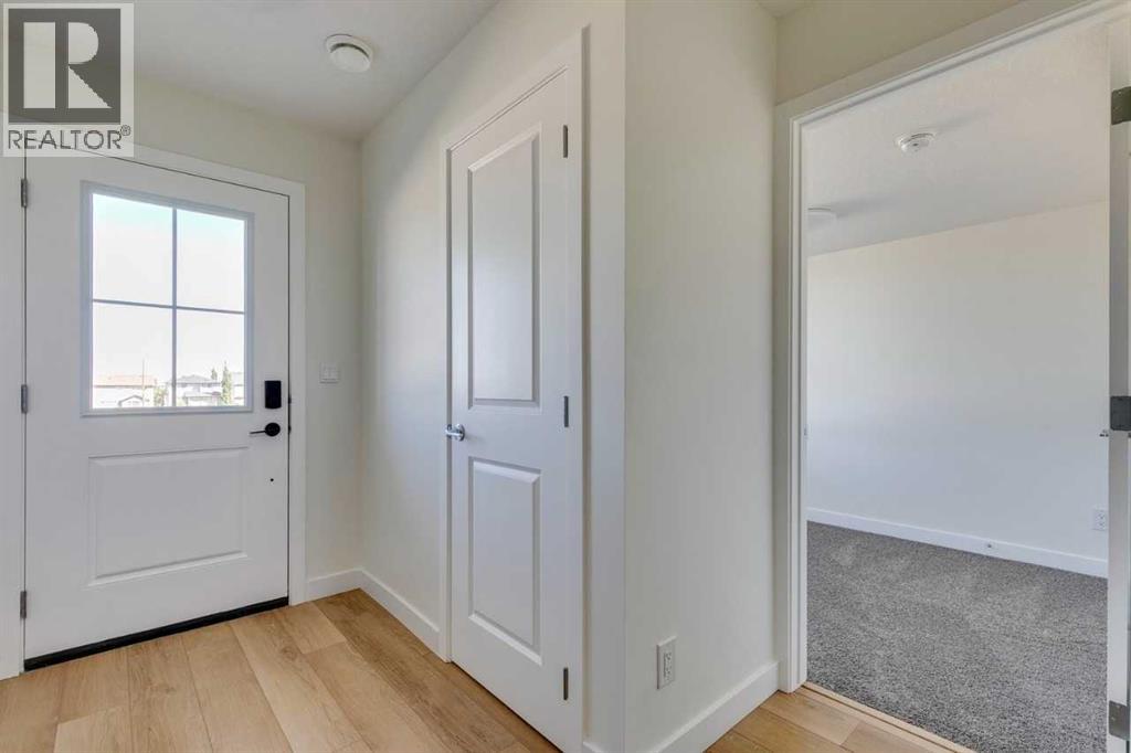 1410, 25 Wildwoods Court Sw, Airdrie, Alberta  T4B 5M3 - Photo 2 - A2228553