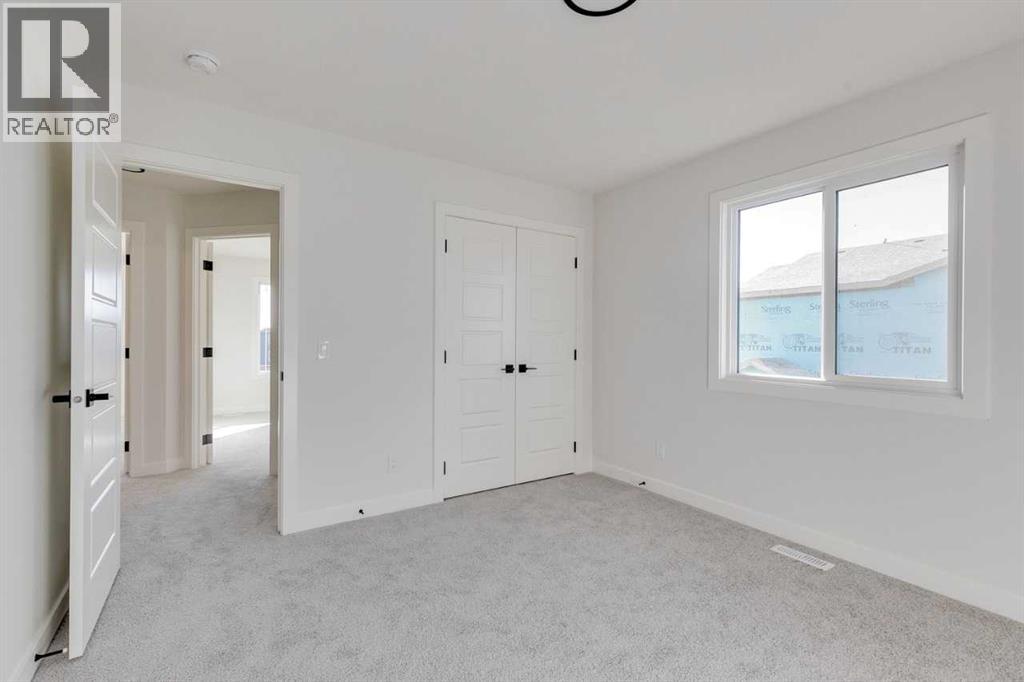 186 Northern Lights Crescent, Langdon, Alberta  T0J 1X2 - Photo 30 - A2250572