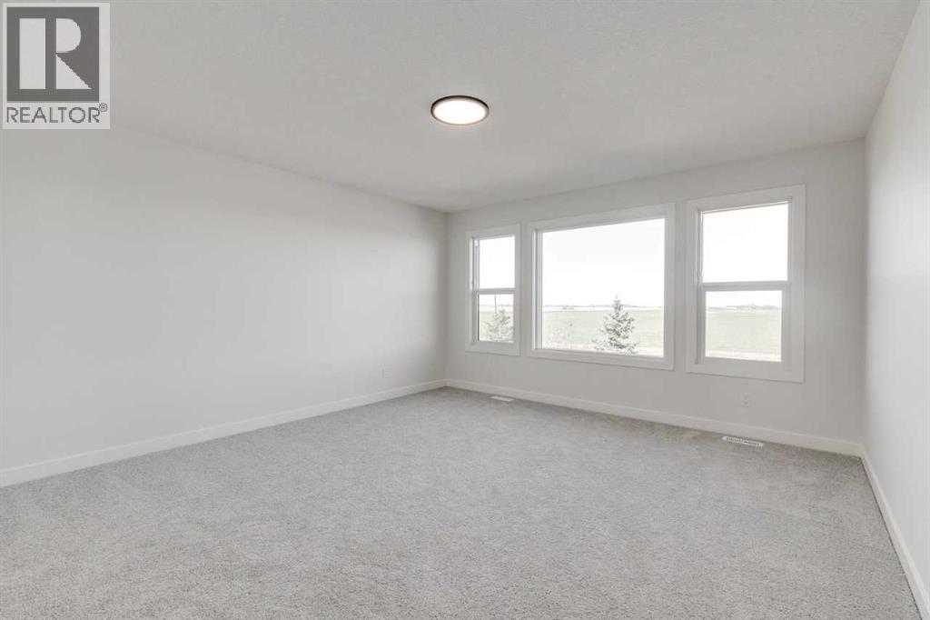 186 Northern Lights Crescent, Langdon, Alberta  T0J 1X2 - Photo 33 - A2250572