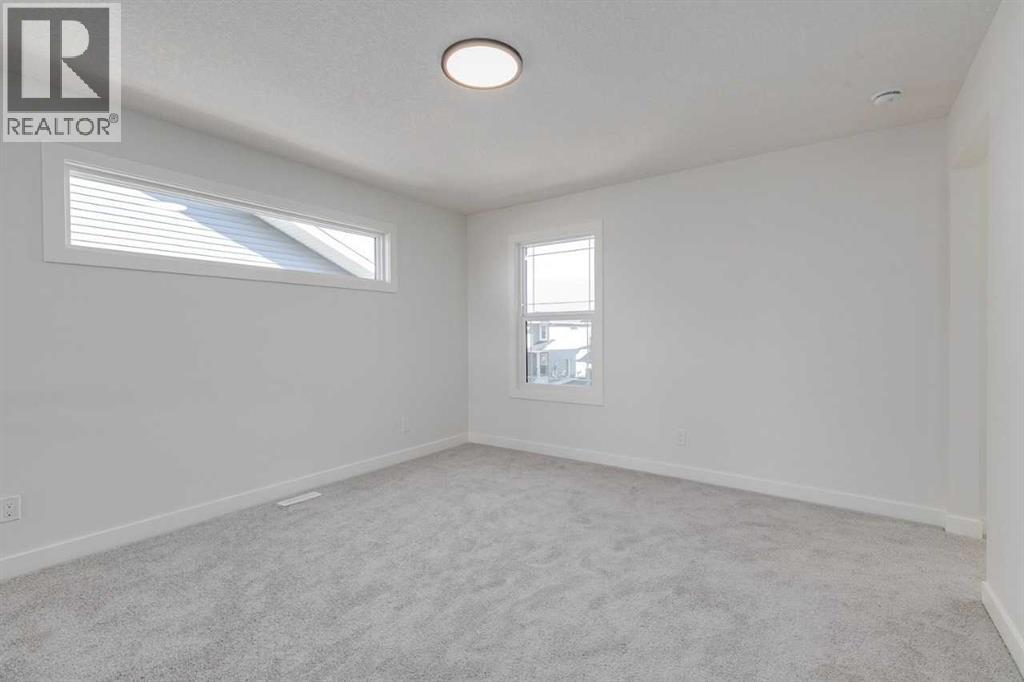 186 Northern Lights Crescent, Langdon, Alberta  T0J 1X2 - Photo 22 - A2250572