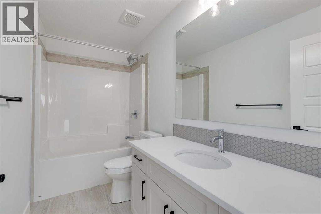 186 Northern Lights Crescent, Langdon, Alberta  T0J 1X2 - Photo 31 - A2250572