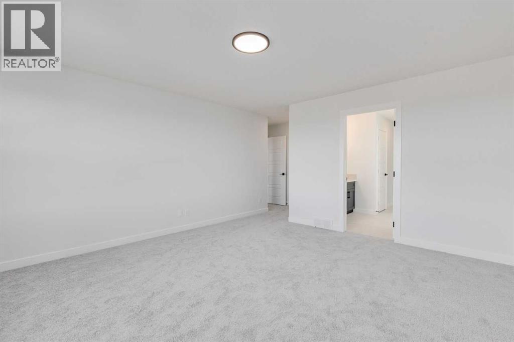 186 Northern Lights Crescent, Langdon, Alberta  T0J 1X2 - Photo 35 - A2250572