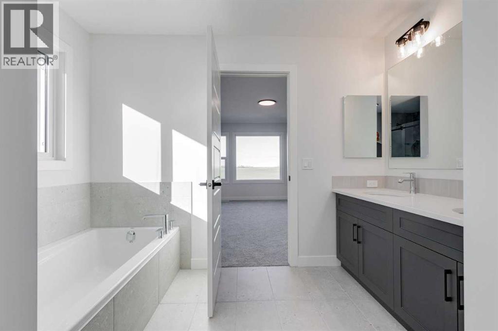 186 Northern Lights Crescent, Langdon, Alberta  T0J 1X2 - Photo 39 - A2250572