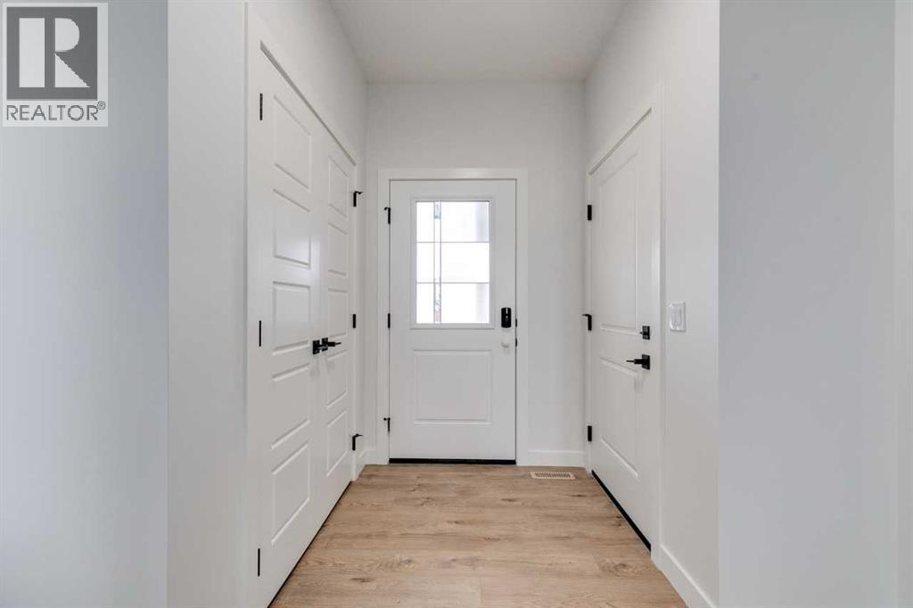 186 Northern Lights Crescent, Langdon, Alberta  T0J 1X2 - Photo 4 - A2250572