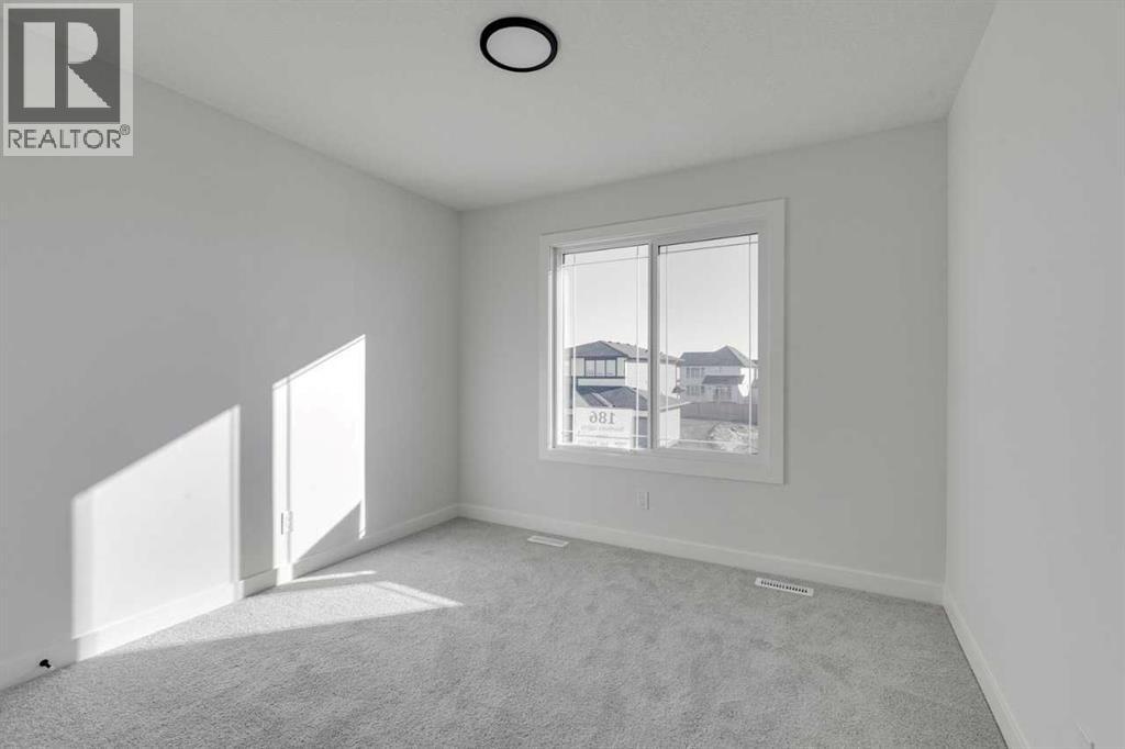 186 Northern Lights Crescent, Langdon, Alberta  T0J 1X2 - Photo 25 - A2250572