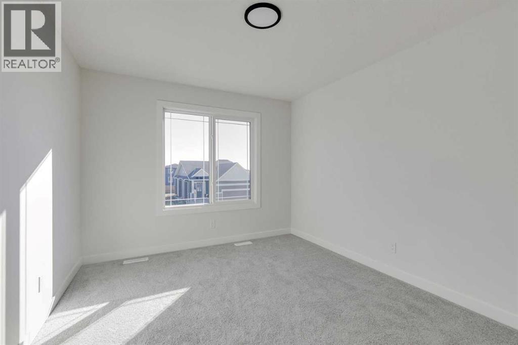 186 Northern Lights Crescent, Langdon, Alberta  T0J 1X2 - Photo 27 - A2250572