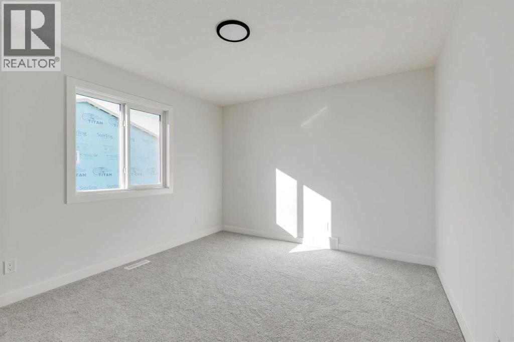 186 Northern Lights Crescent, Langdon, Alberta  T0J 1X2 - Photo 29 - A2250572