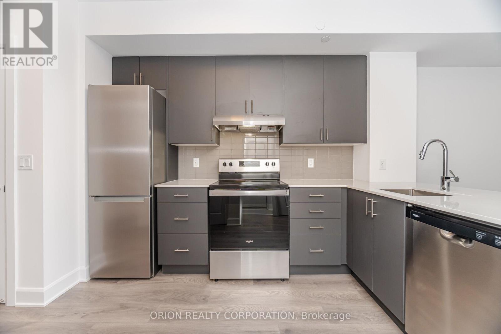 407 - 3240 William Coltson Avenue, Oakville, Ontario  L6H 8C8 - Photo 5 - W12521708