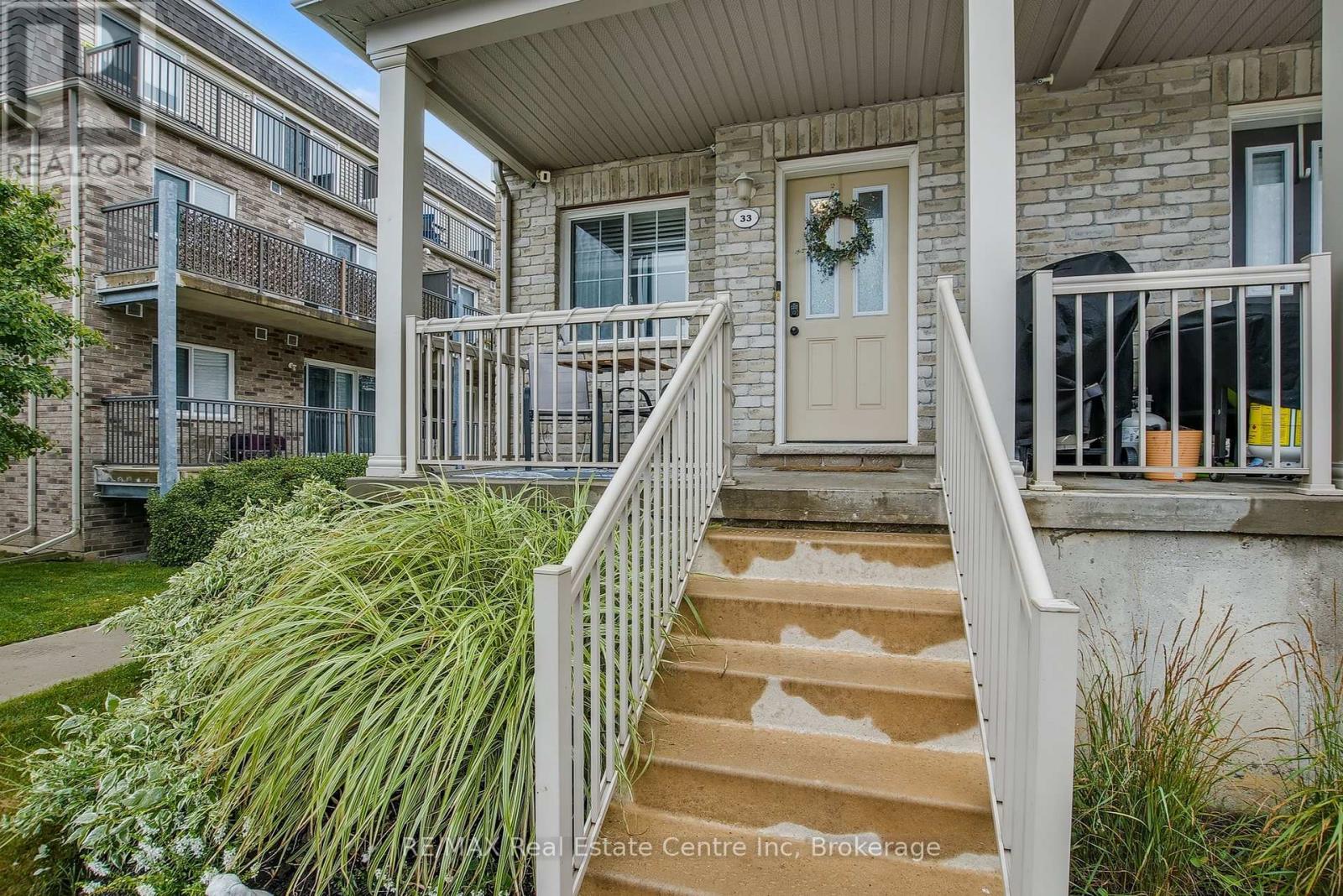 33 - 35 Mountford Drive, Guelph, Ontario N1E 0G6 - Photo 1 - X12521892