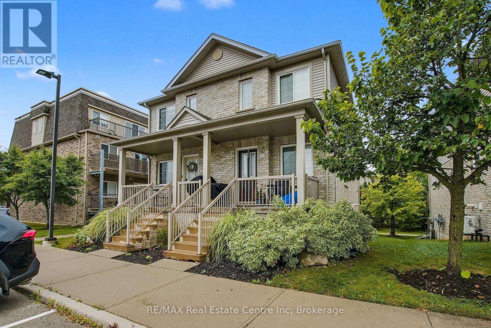 33 - 35 Mountford Drive, Guelph, Ontario N1E 0G6 - Photo 2 - X12521892