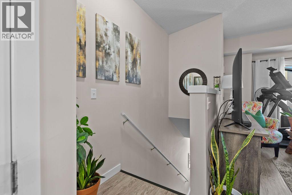 1426, 2461 Baysprings Link Sw, Airdrie, Alberta  T4B 4C6 - Photo 4 - A2264048