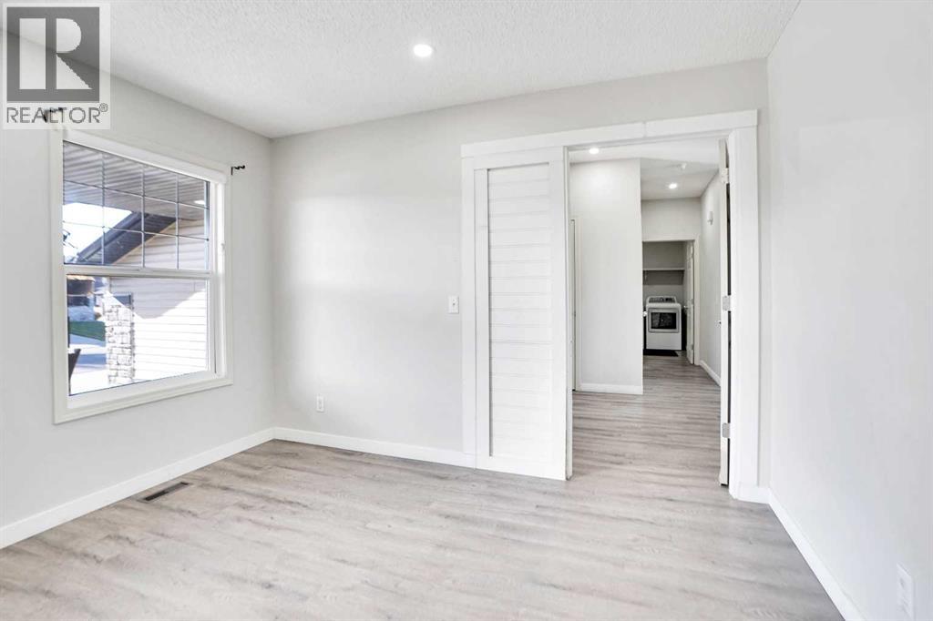 85 Boulder Creek Manor Se, Langdon, Alberta  T0J 1X3 - Photo 5 - A2266885