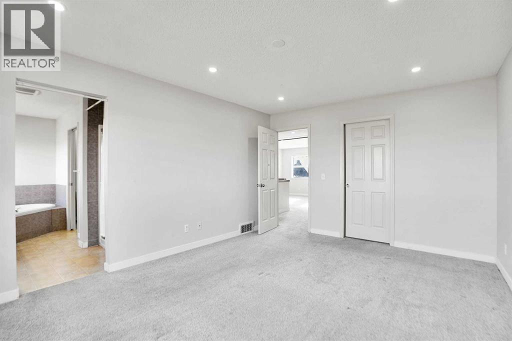 85 Boulder Creek Manor Se, Langdon, Alberta  T0J 1X3 - Photo 31 - A2266885