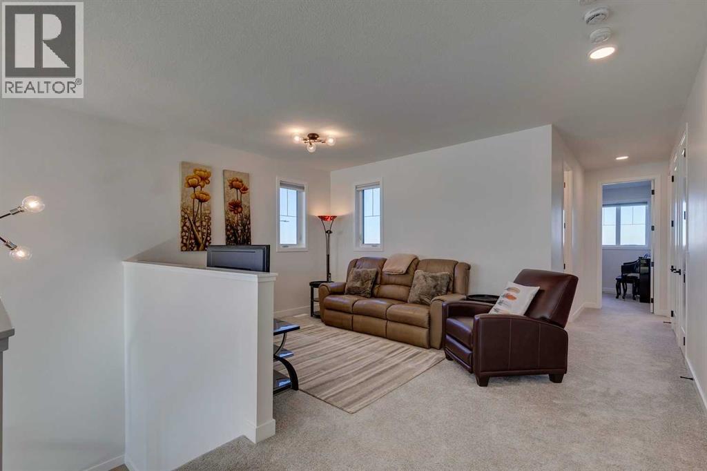 794 Bluerock Way Sw, Calgary, Alberta  T2Y 0S4 - Photo 22 - A2266458