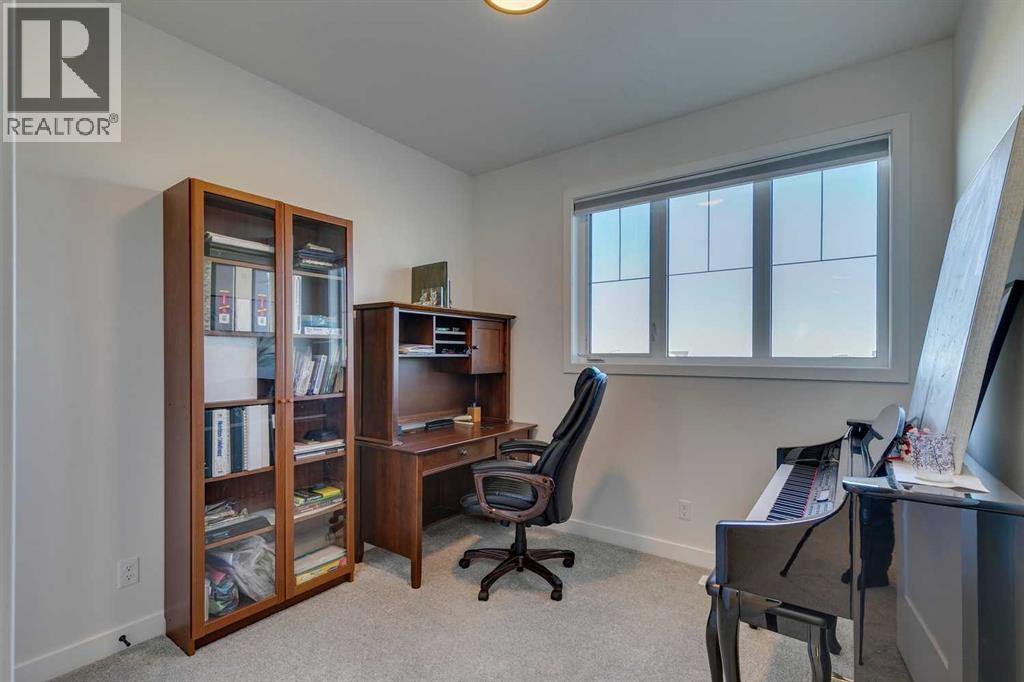 794 Bluerock Way Sw, Calgary, Alberta  T2Y 0S4 - Photo 24 - A2266458