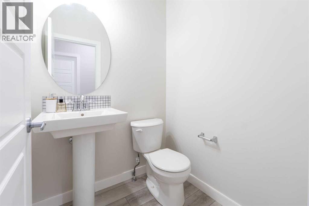 15 Midgrove Drive Sw, Airdrie, Alberta  T4B 5H1 - Photo 10 - A2269302