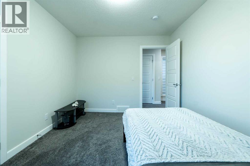 15 Midgrove Drive Sw, Airdrie, Alberta  T4B 5H1 - Photo 31 - A2269302