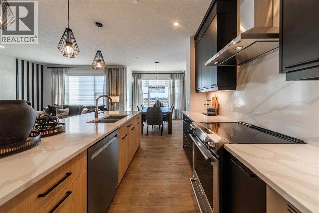 203 Lucas Common Nw, Calgary, Alberta  T3P 2B3 - Photo 4 - A2254542