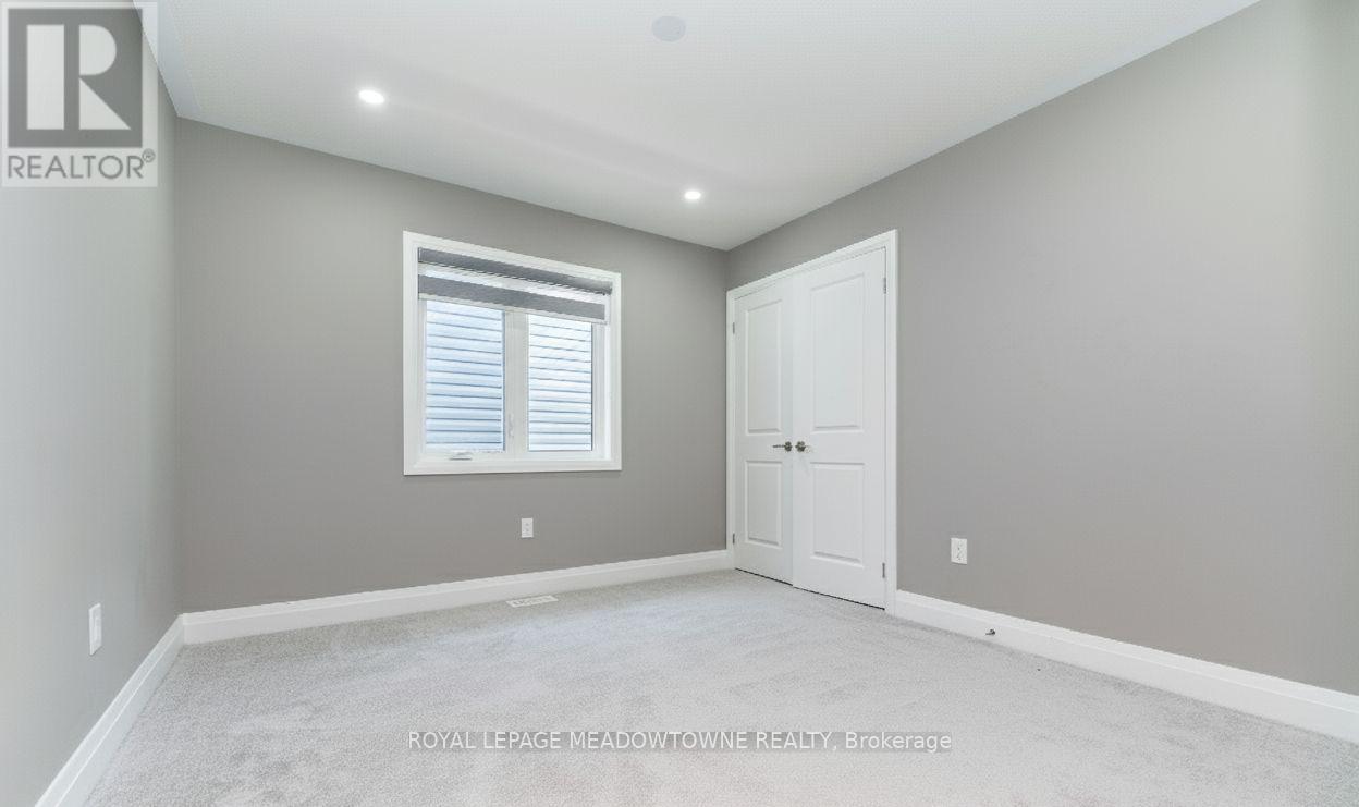 127 Yates Drive, Milton, Ontario L9E 1S5 - Photo 13 - W12522938