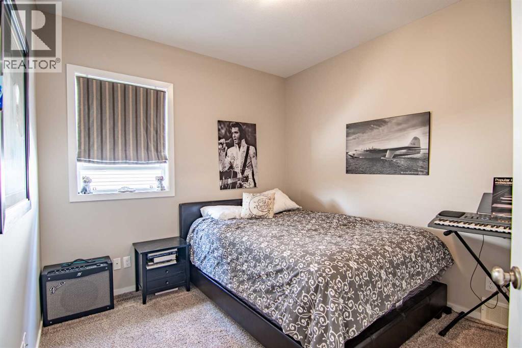 129 Mann Drive, Penhold, Alberta  T0M 1R0 - Photo 20 - A2254862