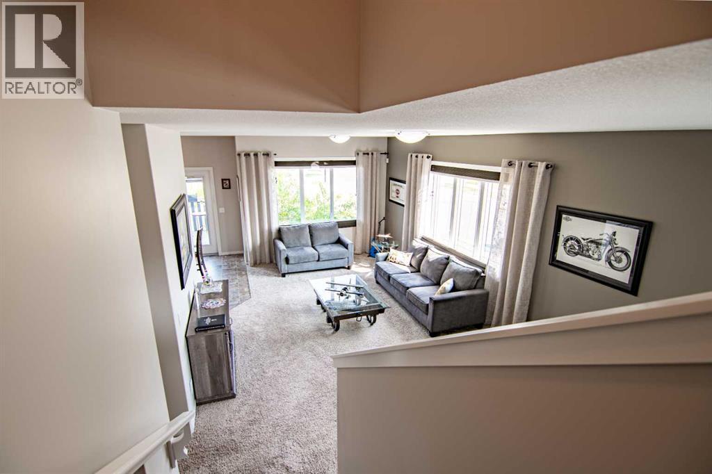 129 Mann Drive, Penhold, Alberta  T0M 1R0 - Photo 6 - A2254862