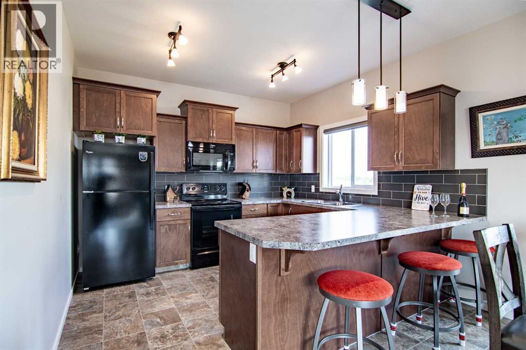 129 Mann Drive, Penhold, Alberta  T0M 1R0 - Photo 13 - A2254862