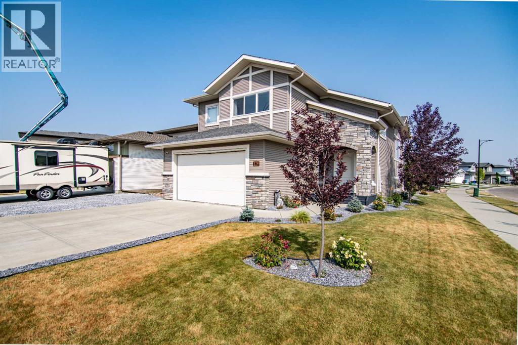 129 Mann Drive, Penhold, Alberta  T0M 1R0 - Photo 2 - A2254862