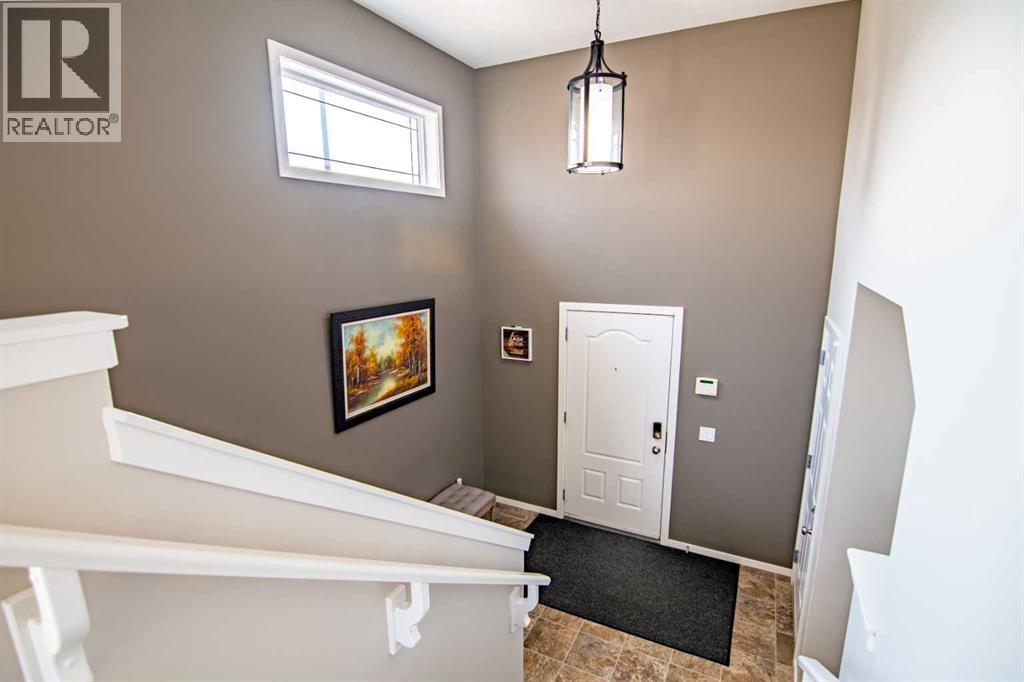 129 Mann Drive, Penhold, Alberta  T0M 1R0 - Photo 4 - A2254862