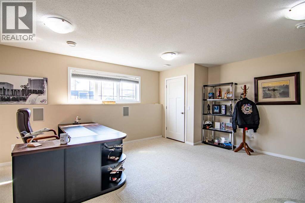 129 Mann Drive, Penhold, Alberta  T0M 1R0 - Photo 27 - A2254862