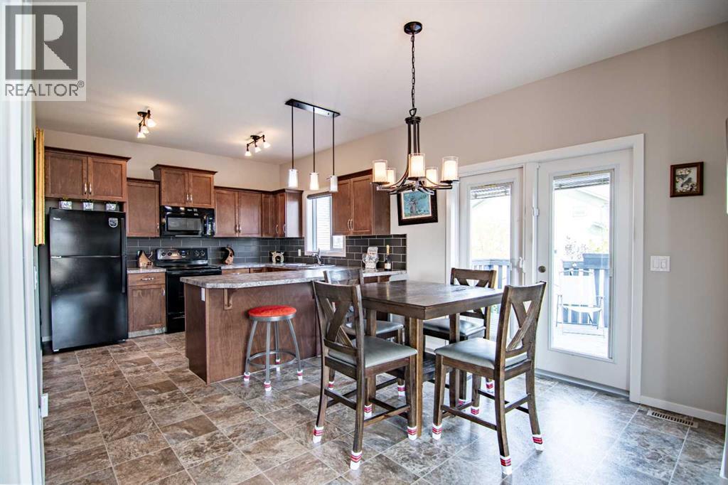 129 Mann Drive, Penhold, Alberta  T0M 1R0 - Photo 11 - A2254862