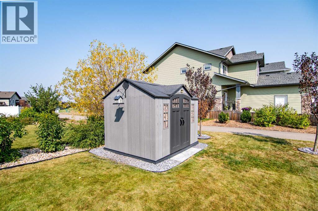 129 Mann Drive, Penhold, Alberta  T0M 1R0 - Photo 35 - A2254862