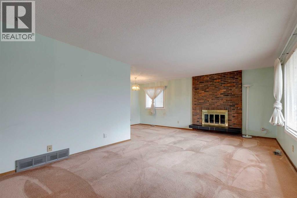 6320 Rundlehorn Drive Ne, Calgary, Alberta  T1Y 1M7 - Photo 5 - A2268766