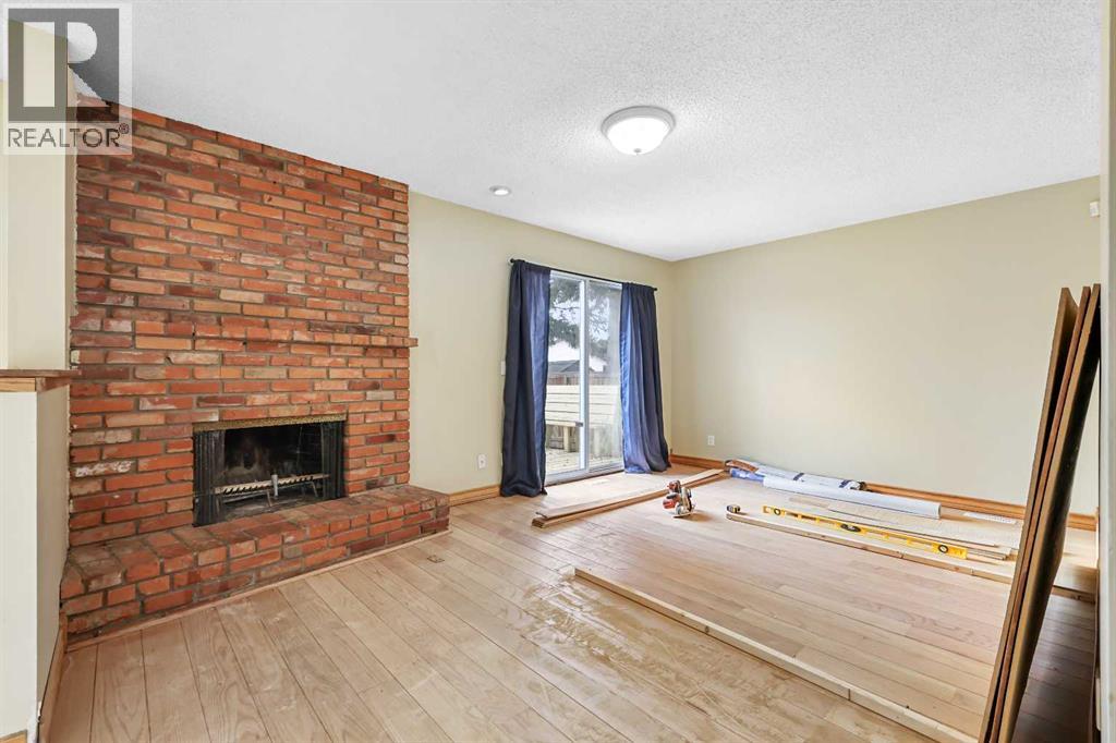 115 Brookgreen Drive Sw, Calgary, Alberta  T2W 2W4 - Photo 4 - A2268291