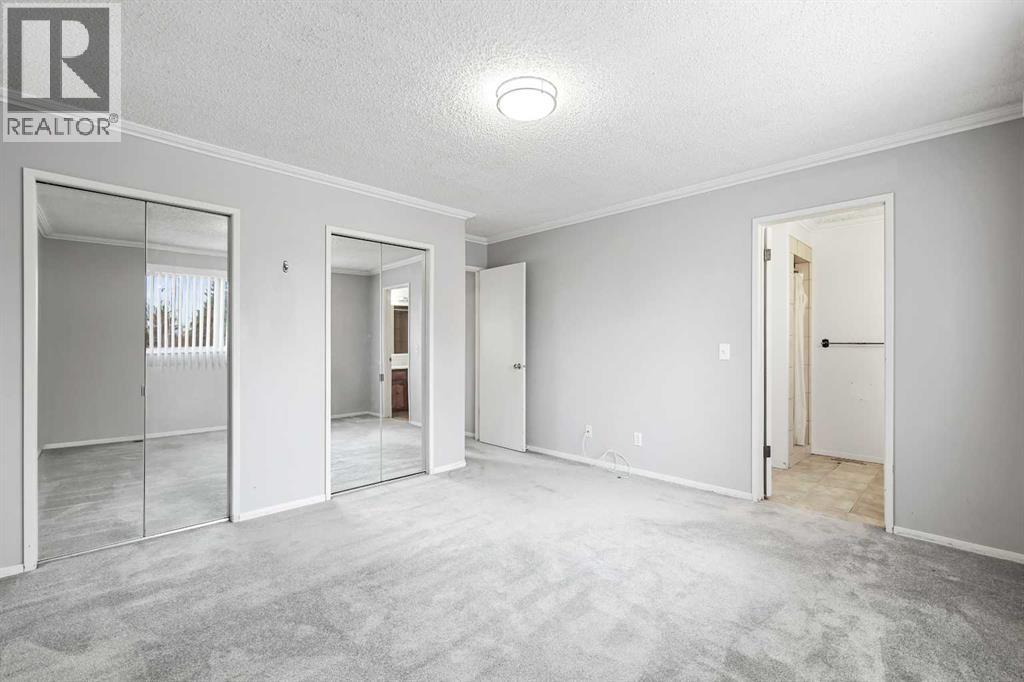 115 Brookgreen Drive Sw, Calgary, Alberta  T2W 2W4 - Photo 7 - A2268291