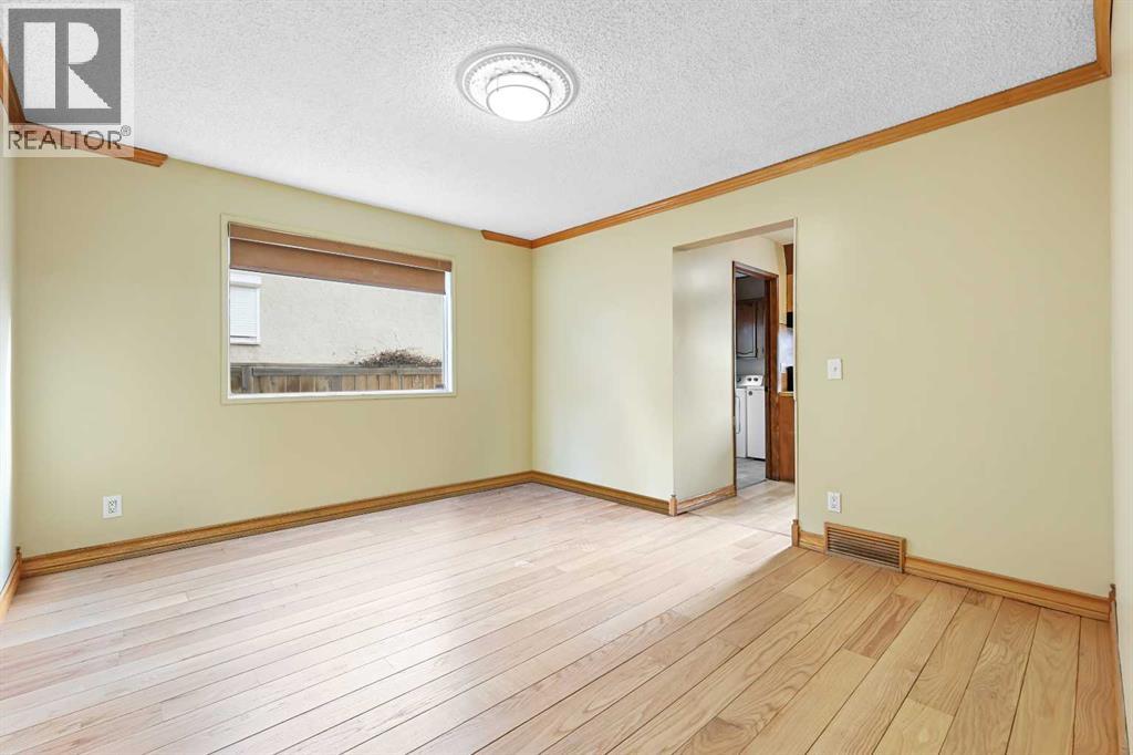 115 Brookgreen Drive Sw, Calgary, Alberta  T2W 2W4 - Photo 6 - A2268291