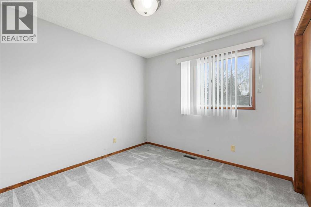 115 Brookgreen Drive Sw, Calgary, Alberta  T2W 2W4 - Photo 8 - A2268291